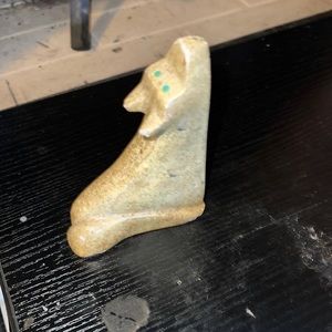 Native American wolf sculpture.